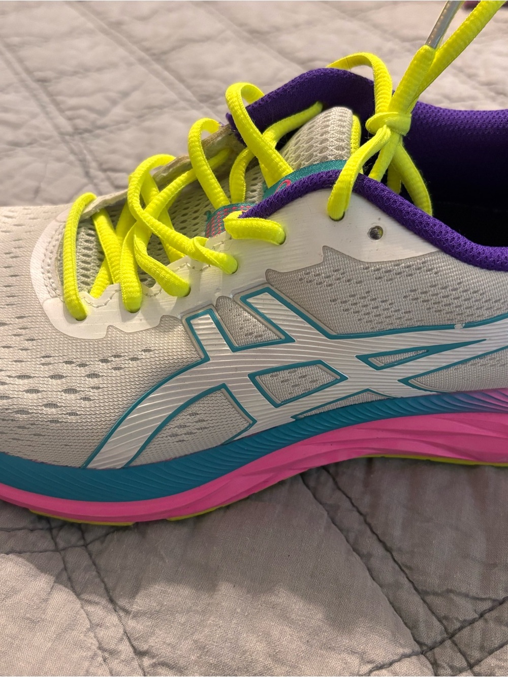 Assics White Athletic Shoe with Neon Yellow Laces and Purple Collar